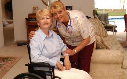 Recovery Patient in wheelchair with caregiver