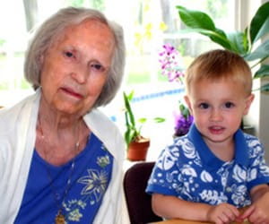 Grandmother and young child sitting